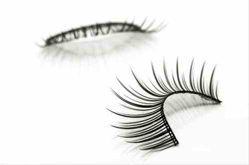A photograph of a pair of false eyelashes with long lashes